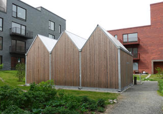 PEAK Cykeloverdaekninger I To Etager Med Lamelbeklaedning