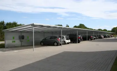 PLAN Carportanlaeg Med Hulpladebeklaedning Og Ladestander