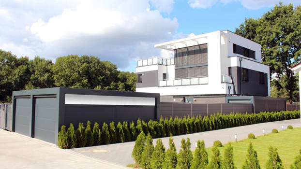 KUBIC-garager med ledhejseporte og beklædning i Isopanel